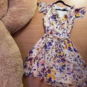 spring/summer floral whimsical dress w/ ruffle details. Size 14 or med/large.